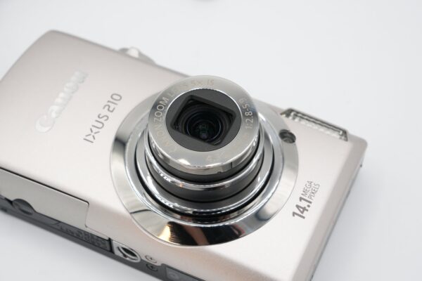 36e49b7fe12449cfb3ed8a334952d77c Canon IXUS 210